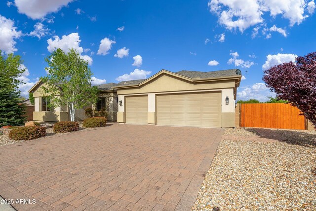 4253 N Yates Ave, Prescott Valley, AZ 86314 - ranch-style home featuring stucco siding, driveway, an attached garage, and fence