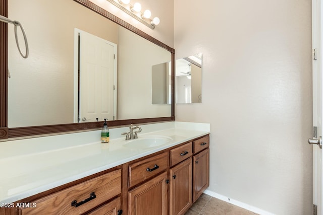 4253 N Yates Ave, Prescott Valley, AZ 86314 - bathroom with vanity, tile patterned floors, ceiling fan, and baseboards