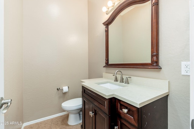 4253 N Yates Ave, Prescott Valley, AZ 86314 - half bath featuring vanity, toilet, baseboards, a textured wall, and tile patterned floors