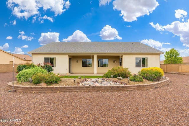 4253 N Yates Ave, Prescott Valley, AZ 86314 - rear view of property with stucco siding, fence, a patio, and roof with shingles