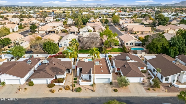 aerial view with a mountain view and a residential view