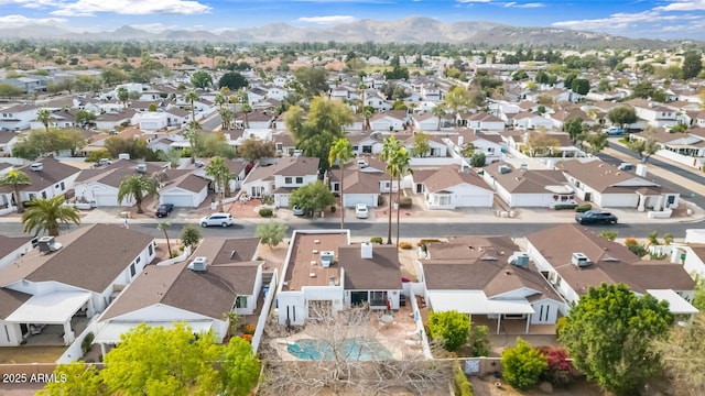 birds eye view of property featuring a mountain view and a residential view