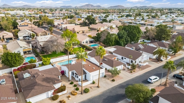 bird's eye view featuring a mountain view and a residential view