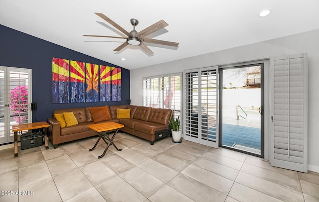 living room featuring tile patterned flooring, recessed lighting, lofted ceiling, and a ceiling fan