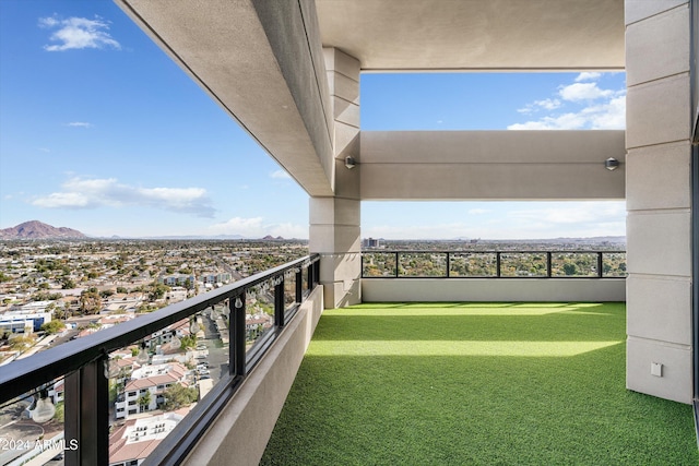 balcony featuring a mountain view