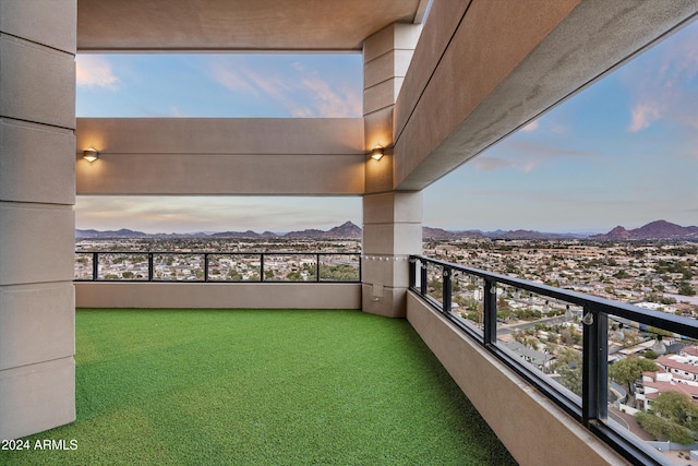 balcony featuring a mountain view