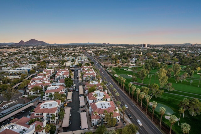 aerial view at dusk with a mountain view