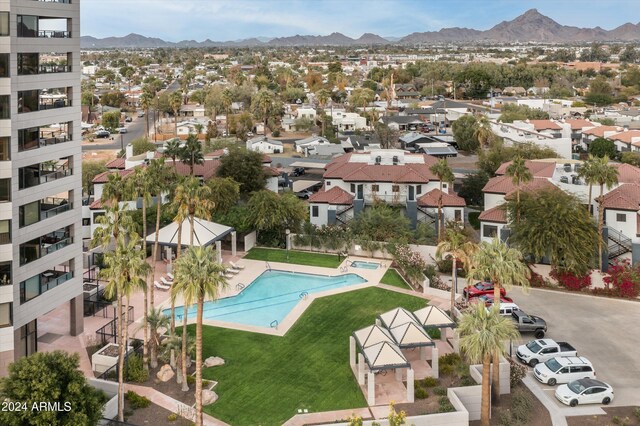 view of pool with a mountain view