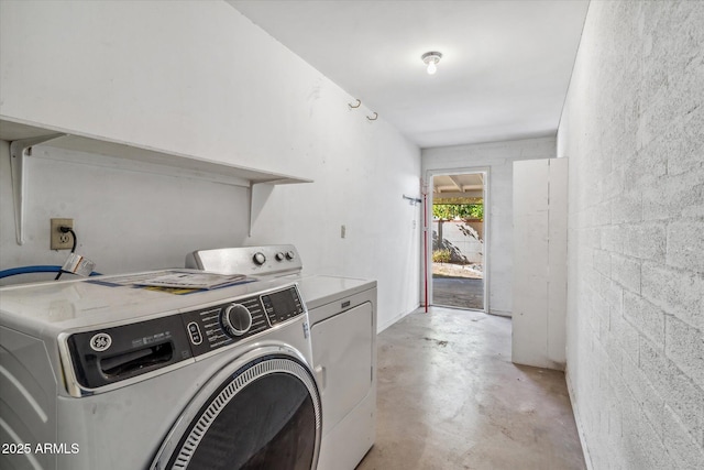 washroom featuring independent washer and dryer