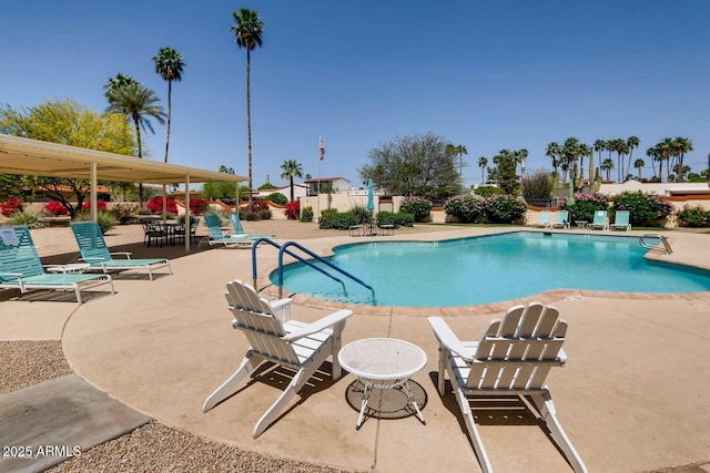 view of swimming pool featuring a patio