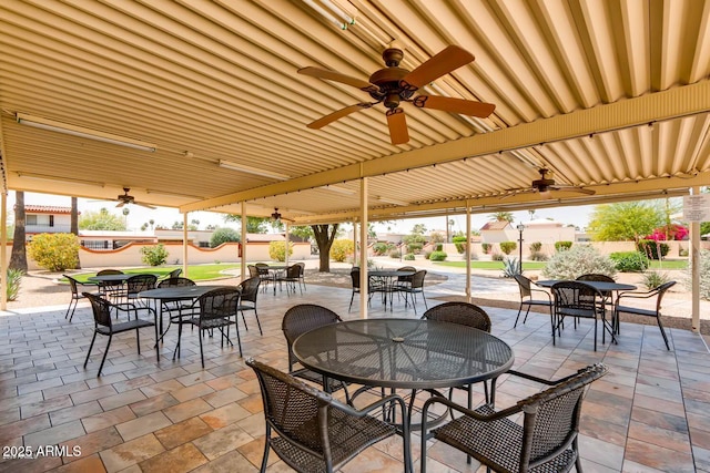 view of patio featuring ceiling fan