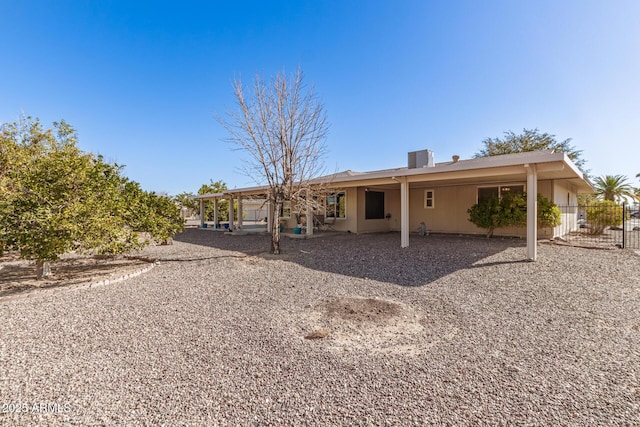 9826 W Emberwood Dr, Sun City, AZ 85351 - back of property featuring a patio area and fence