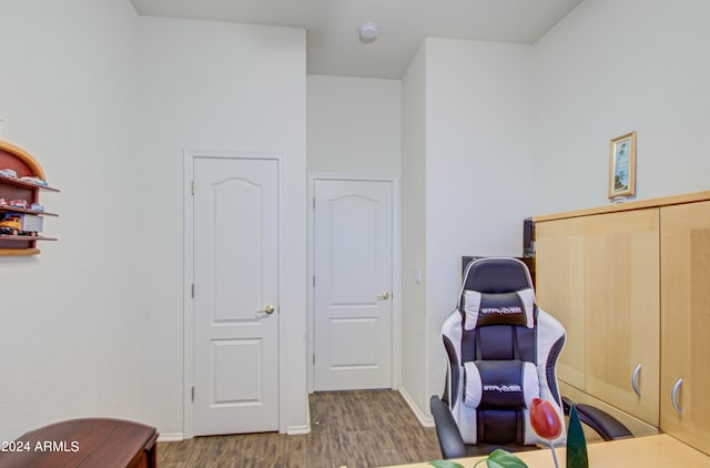 sitting room with dark hardwood / wood-style flooring