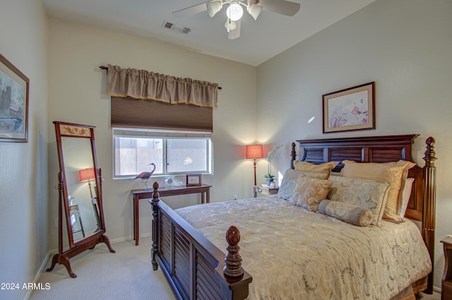 bedroom with light carpet and ceiling fan