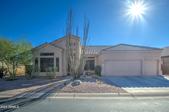 view of front of home with a garage