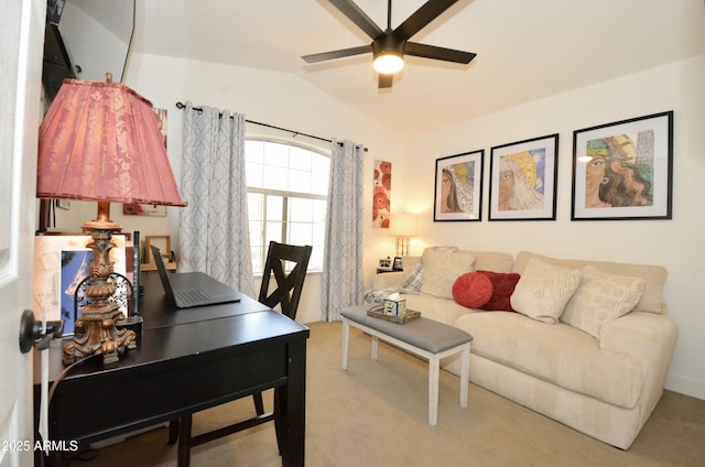 carpeted office with vaulted ceiling and ceiling fan