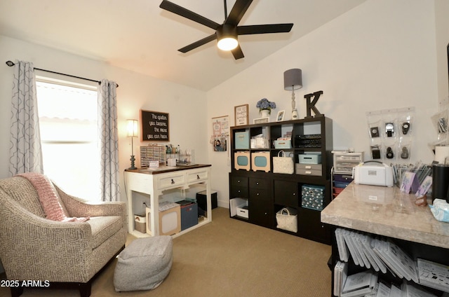 office featuring a ceiling fan, lofted ceiling, and carpet