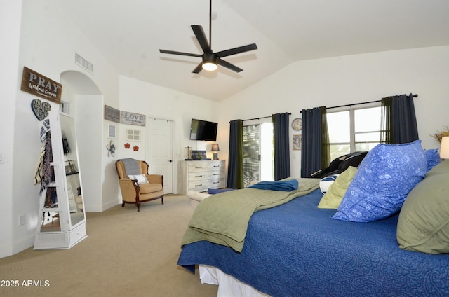 bedroom featuring visible vents, a ceiling fan, arched walkways, carpet, and vaulted ceiling