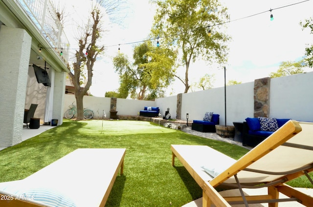 view of yard featuring a fenced backyard