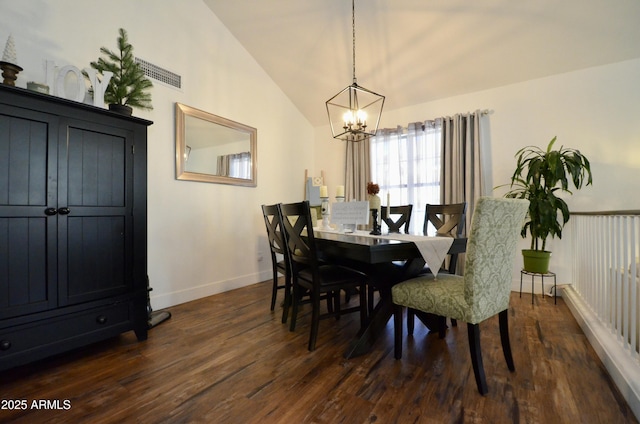 dining area featuring vaulted ceiling, a notable chandelier, baseboards, and dark wood-type flooring