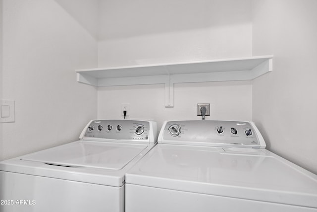 laundry room featuring separate washer and dryer