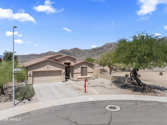 16404 S 18th Dr, Phoenix, AZ 85045 - view of front of property with stucco siding, a mountain view, an attached garage, driveway, and a tile roof