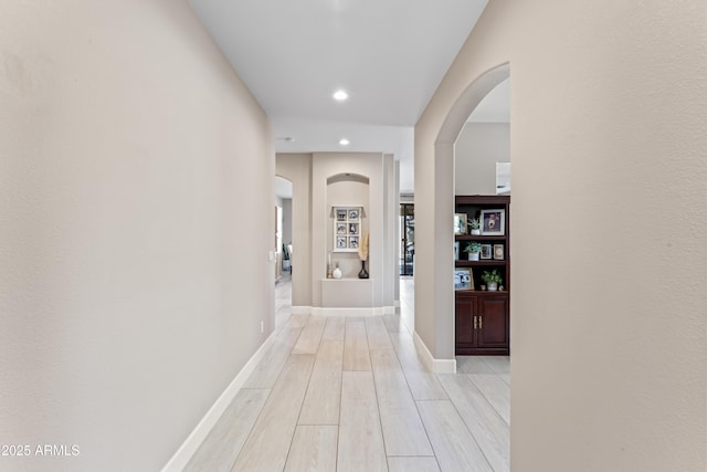 16404 S 18th Dr, Phoenix, AZ 85045 - corridor featuring arched walkways, recessed lighting, and light wood-style floors