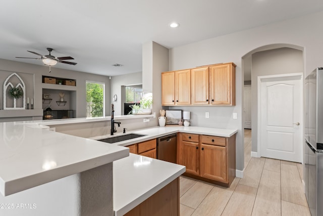 16404 S 18th Dr, Phoenix, AZ 85045 - kitchen with a sink, a peninsula, light countertops, ceiling fan, and stainless steel dishwasher