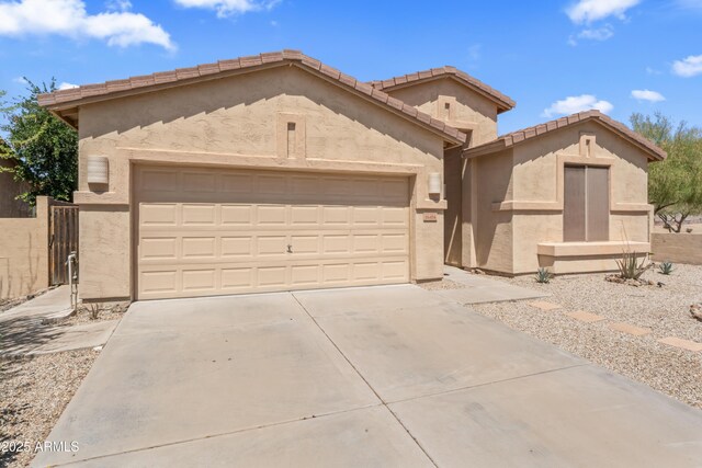 16404 S 18th Dr, Phoenix, AZ 85045 - view of front of home featuring a garage, driveway, and stucco siding