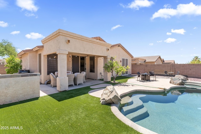 16404 S 18th Dr, Phoenix, AZ 85045 - view of swimming pool featuring a patio, an outdoor kitchen, and a pool with connected hot tub