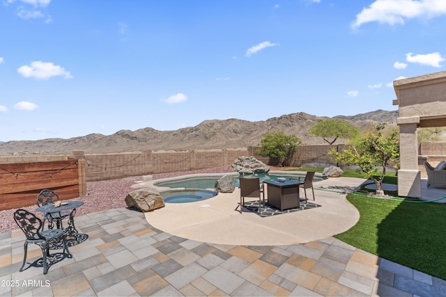 16404 S 18th Dr, Phoenix, AZ 85045 - fenced backyard with a patio area, a mountain view, and an in-ground hot tub