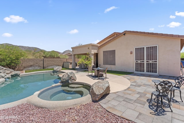 16404 S 18th Dr, Phoenix, AZ 85045 - view of swimming pool with a fenced backyard, a patio, and a pool with connected hot tub