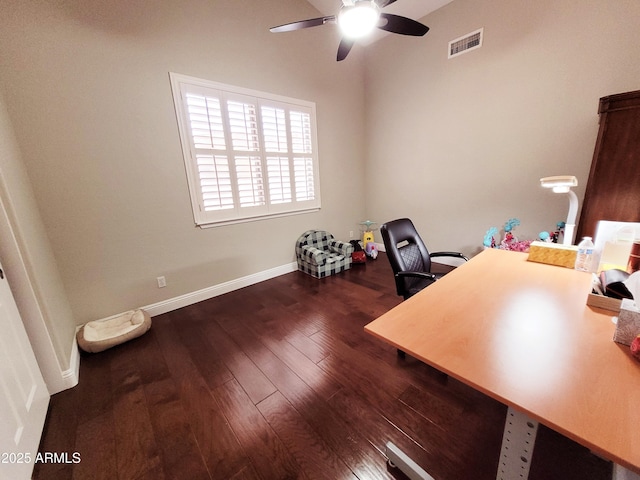 office space with ceiling fan, visible vents, baseboards, and hardwood / wood-style floors