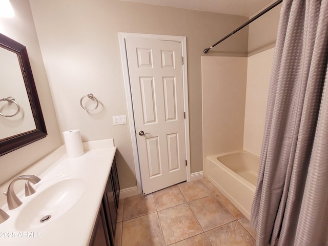 full bathroom with tile patterned floors, vanity, and shower / bath combination with curtain