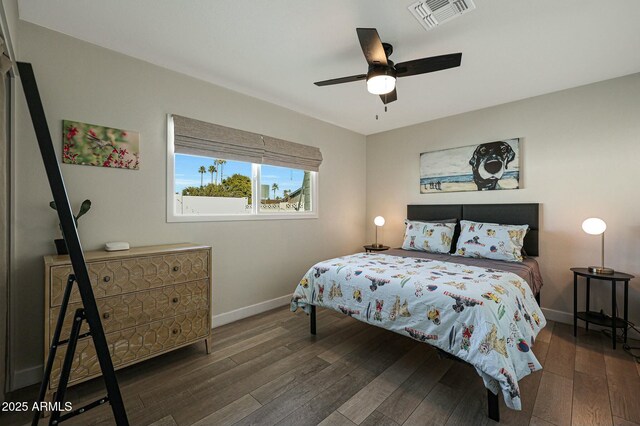 8132 E Valley View Rd, Scottsdale, AZ 85250 - bedroom with hardwood / wood-style floors, baseboards, visible vents, and ceiling fan