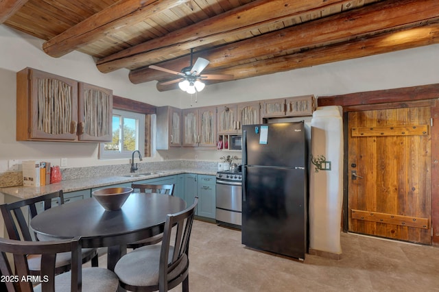 kitchen featuring sink, light stone counters, wooden ceiling, beamed ceiling, and black appliances