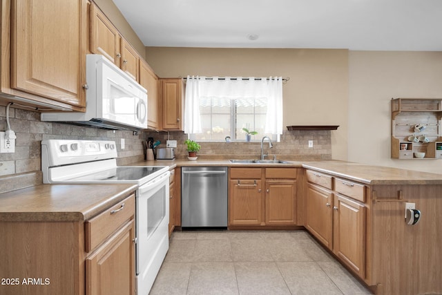 kitchen featuring sink, kitchen peninsula, white appliances, decorative backsplash, and light tile patterned floors