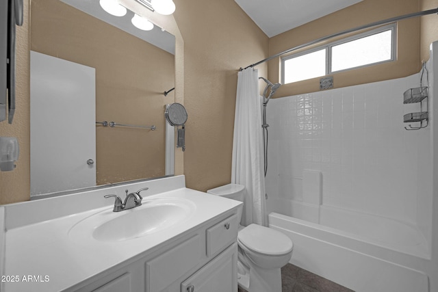 full bathroom with tile patterned floors, shower / tub combo with curtain, vanity, and toilet