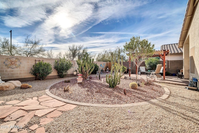 view of yard with a pergola and a patio area