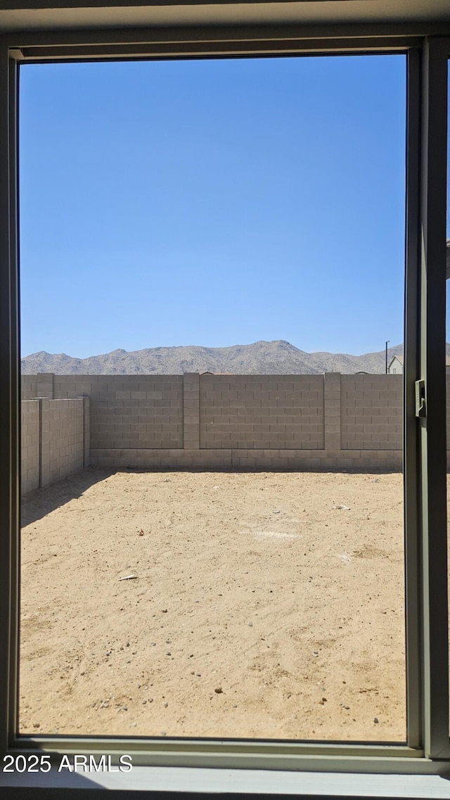 22319 W Monona Ln, Surprise, AZ 85387 - fenced backyard with a mountain view