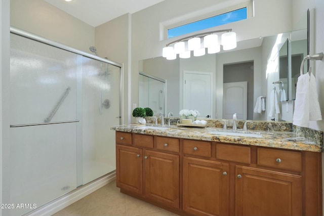 bathroom featuring vanity, tile patterned floors, and walk in shower