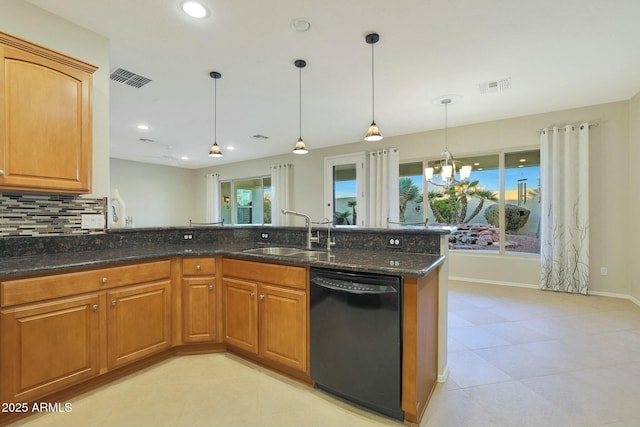 kitchen with sink, dark stone countertops, backsplash, black dishwasher, and decorative light fixtures