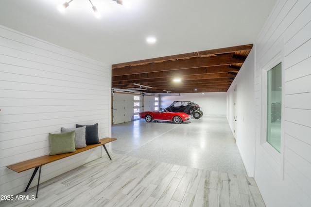 garage with wood walls