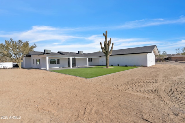 ranch-style house with a front yard