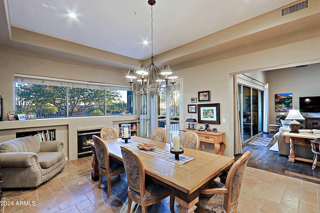 dining area featuring a chandelier