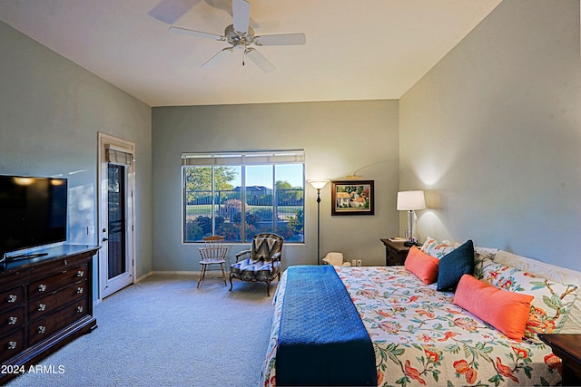 bedroom featuring light colored carpet and ceiling fan