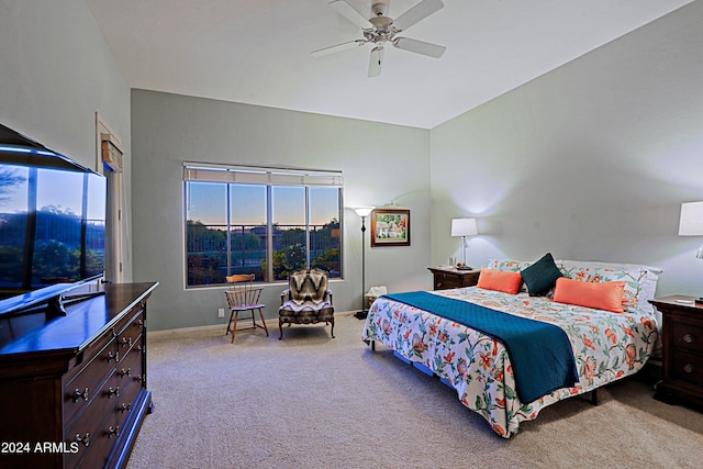 bedroom with light colored carpet and ceiling fan