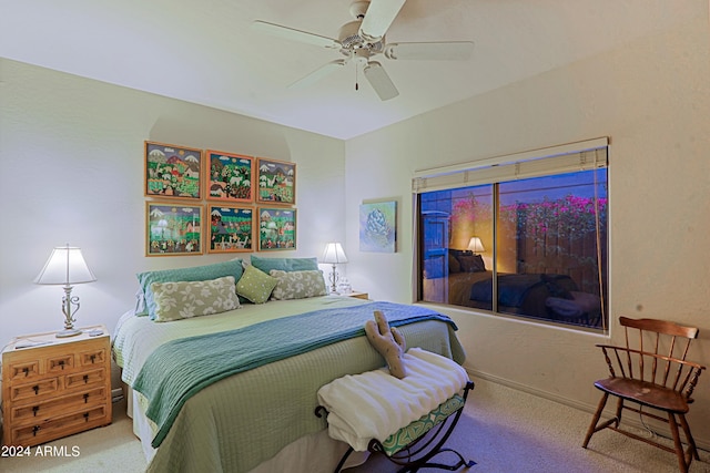 bedroom with ceiling fan and carpet