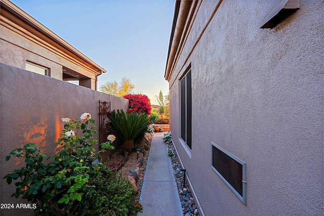 view of property exterior at dusk