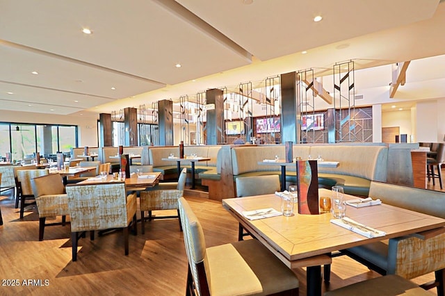 dining space with light wood-type flooring